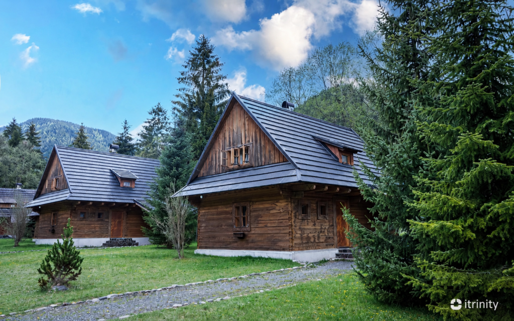 Traditional wooden chalets in a mountain valley at the itrinity team retreat