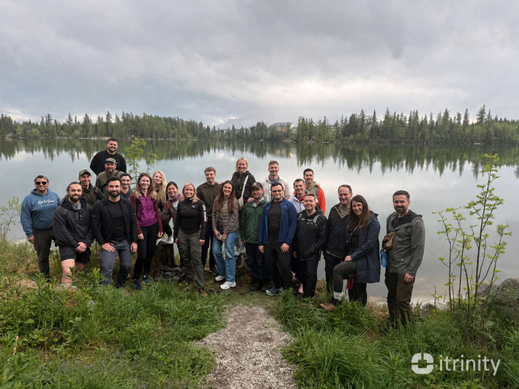 The itrinity team gathered for a group photo in front of Štrbské pleso